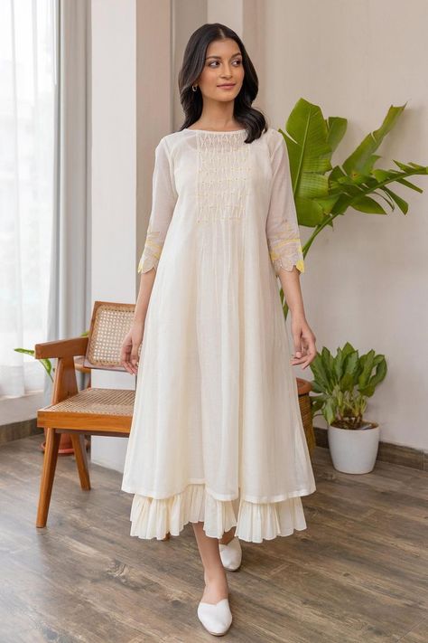 Buy off-white #chanderi #dress with smock pattern on yoke & yellow applique embroidered #floral motifs on sleeve at #AzaFashions Shop online now at #Azafashions.com Call +91 8291990059 or email contactus@azafashions.com for enquiries. #wedding #festive #ethnic #tradional #shopping #shoponline #party डिजाइनर कपड़े, Simple Frock Design, Casual Frocks, Simple Frocks, Simple Kurta Designs, Simple Kurti Designs, Frock For Women, Long Dress Design, Dress Design Patterns