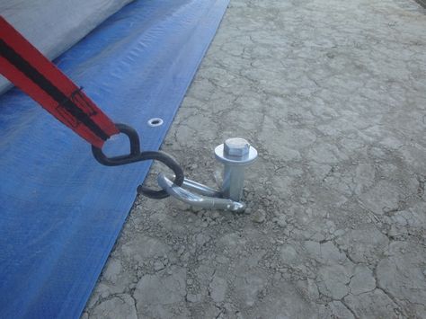 This is a cheap and easy way to make heavy duty tent or tarp stakes. I'm using them for Burning Man to tie down my dome and stake a tarp from my truck to the playa. Reading Burning Man's playa tips I've learned that two foot long pieces of rebar seem to be the best way to go. I've also learned that rebar can be very dangerous if left exposed. I've added a cap to the top to give a slightly larger area to hammer and to make them safe. UPDATE: I've redesigned the stakes for this year's burn. I ... Burning Man Camps, Camping Projects, Survival Tent, Useful Projects, Diy Tent, Survival Backpack, Survival Books, Truck Tent, Tent Stakes