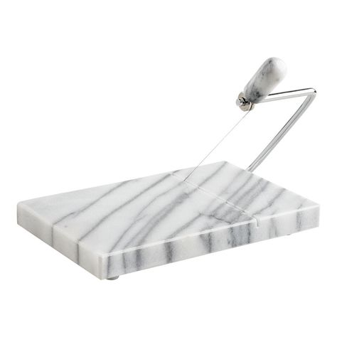 White Marble and Wire Cheese Slicer Serving Board - World Market Cheese Slicer, Charcuterie Cheese, Charcuterie And Cheese Board, Artisan Cheese, Marble Surface, Entertaining Essentials, Christmas Shop, Soft Cheese, Stainless Steel Wire