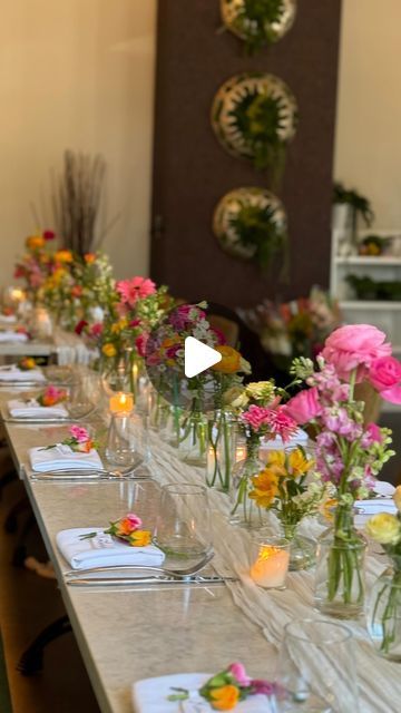 Une Table By Tania | NYC Picnics, tablescapes & flowers on Instagram: "A Baby in Bloom Shower!

*venue: @terravitanj

#babyinbloom #babysprinkle #babyshower #budvases #wildflowers #wildflowertheme #flowers #florals #wildflowergarden #babyshowerideas #babyinbloombabyshower #loveinbloom #flowerrunner" Wildflower Baby Shower Theme Table Decor, Baby In Bloom Table Setting, Baby In Bloom Table Decor, Flower Runner, Bday Dinner, Wildflower Baby Shower, Baby In Bloom, Flowers Instagram, Bloom Baby