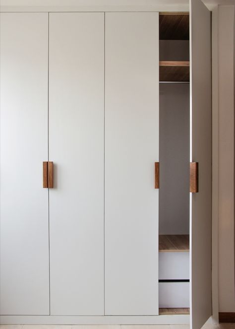 Minimal Wooden Door Handles for bedroom closets in our 'Apartment No.149' Project. Closet Handles Bedrooms, Handles For Cupboards, Modern Built In Closet, White Closet Handles, Minimal Closet Doors, Modern Bedroom Closet Doors, Bedroom Closet Inspirations, Minimal Storage Ideas, Mid Century Modern Bifold Closet Doors