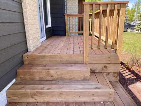 The horizontal fascia along all vertical sides blends nicely with the top decking and stair tops. Side Steps To Front Door, Deck Corner Stairs, Small Front Steps Ideas, Back Porch Stairs, Small Front Deck Ideas, Wrap Around Steps, Free Standing Porch, Deck Steps Ideas, Midcentury Cottage