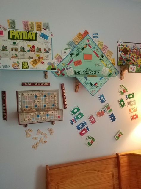 Board Games On The Wall, Game Board Shelves, Wall Mounted Board Games, Game Board Display Ideas, Repurpose Old Board Games, Board Game Room Design Ideas, Board Game Shadow Boxes, Boardgame Display Ideas, Board Game Table Decorations