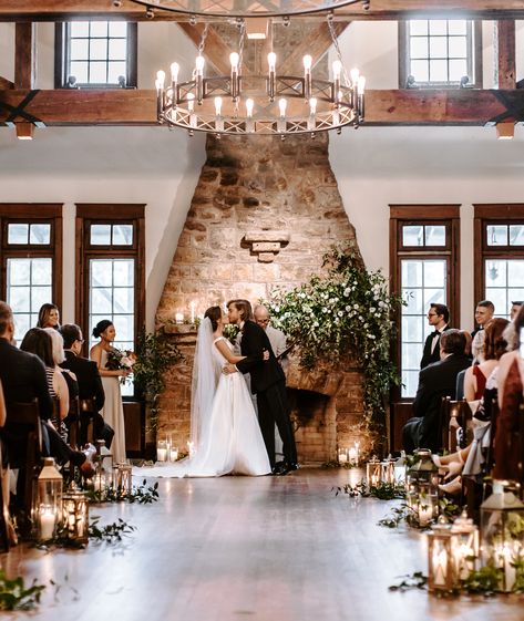 Wedding With Fireplace, Wedding Alter Lanterns, Lanterns At Wedding Ceremony, Lantern Ceremony Decor, Indoor Rustic Wedding Ceremony, Cozy Wedding Ceremony, Wedding Arch In Front Of Fireplace, Indoor Fireplace Wedding Ceremony, Fireplace Wedding Decor Ceremony