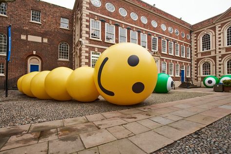 The team at Glow was delighted to be asked once again to produce a collection of inflatable artworks for artist Bruce Asbestos. His newly commissioned work is currently on display in the courtyard at the Bluecoat in Liverpool and is inspired by the iconic building’s architectural features. The collection includes a giant yellow smiling worm representing Rest, an oversized cartoon-like arm representing Connection and Classical Facade, Liverpool Uk, Giant Inflatable, History Painting, The Courtyard, Iconic Buildings, High Art, Blue Coats, Architectural Features