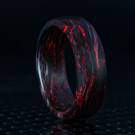 Every Red Burl Carbon Fiber Ring is made from a composite sheet using recycled materials and renewable energy. Red pigment is immersed throughout a black carbon fiber base in a beautiful and unique swirl-like forged pattern. Sizing: For orders placed through Facebook or Instagram Shop, please contact us at support@patr Paisley Wedding, Carbon Fiber Ring, Cool Rings For Men, Carbon Fiber Rings, Red Pigment, Promise Rings For Guys, Cute Engagement Rings, Anime Jewelry, Mens Rings Fashion