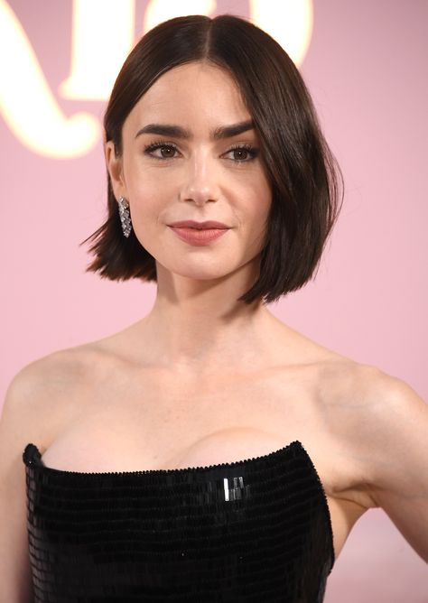 Say hello to your next haircut. The razored bob is the hair trend predicted to blow up this autumn. Here’s how to wear it now. Lily Collins Bob, Lily Collins Short Hair, Lily Collins Hair, Razored Bob, Corte Bob, Square Face Shape, Best Eyebrow Products, Eyebrow Shape, Long Faces