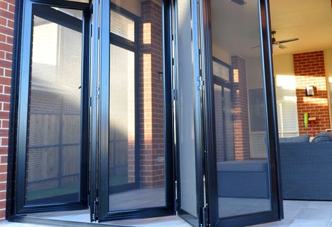 Unlike many security solutions, Crimsafe Bi-Fold Security Screen Doors can be folded away, offering superior protection without intruding on your lifestyle. Bifold Screen Door Ideas, Crimsafe Screens, Garden Gates Wooden, Wooden Gate Door, House Interior Makeover, Security Door Design, Folding Door Hardware, Home Maintenance Schedule, Patio Screen