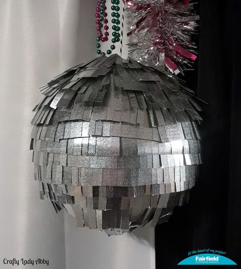 PARTY DIY: New Year's Eve OlyFun Fringe Ball New Years Ball Drop, Mercury Glass Centerpiece, New Years Eve Ball, New Years Ball, New Years Hat, How To Make Glitter, Party Horns, Ball Drop, Party Diy