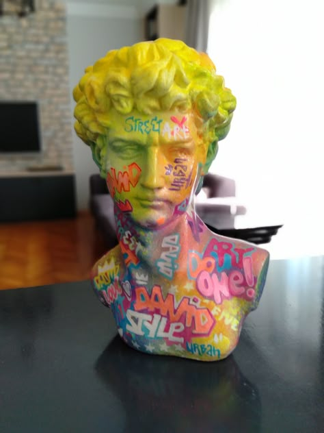 Street Art David Bust,Yellow Italian Modern Handmade Statue,Graffiti,Antique Michelangelo's Greek Sculpture,Home Decor,Italian style The most beautiful way to decorate your home is with this magnificent hand crafted bust of David . This antique sculpture design adds a special piece of art to every home. Our product is made of polyester and hand-painted with acrylic paint. The material is poured into our custom mold, and then each detail is added by hand. Dimensions:   Height:35cm Width:22cm Dept Statue Graffiti, Graffiti Bedroom, Graffiti Furniture, David Bust, Weird Furniture, Greek Decor, Sculpture Home Decor, Antique Sculpture, Maximalist Design