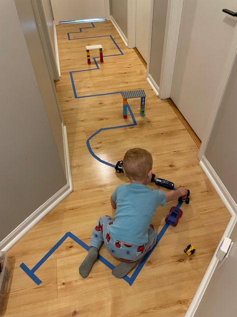 Use painters tape to create a road for cars down a hallway or open area- quick, easy and cheap way to provide hours of entertainment! Toddler Window Activity, Transportation Sensory, Toddler Home Activities, Nanny Activities, Homeschool Preschool Activities, Block Center, 3 Birthday, Community Activities, Autumn Activities For Kids