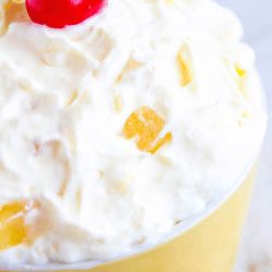 Pina Colada Fluff | High Heels and Grills Pina Colada Fluff, Easter Side Dishes Recipes, Tropical Desserts, Easter Side Dishes, Fluff Recipe, Fluff Desserts, Coconut Pudding, Easter Dinner Recipes, Dessert Salads