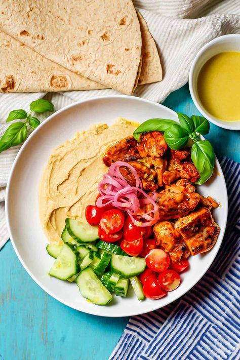 Chicken hummus bowls with tender chunks of chicken, creamy hummus, fresh veggies and a light, lemony vinaigrette are a healthy, hearty lunch or dinner. Chicken Hummus Bowl, Lemony Vinaigrette, Hummus Bowls, Veggie Roll Ups, Chicken Hummus, Hummus Bowl, Creamy Hummus, Hummus And Pita, Hearty Lunch