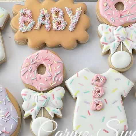 31 likes, 1 comments - carmz_sweets_ on February 9, 2024: "Donut baby shower 💗 #Carmzsweets #sugarcookieart #bakersfieldsugarcookies #bakersfieldcookie..." Baby Sprinkle Cookies Girl, Onesies Cookies Decorated, Onesie Decorated Cookies, Baby Onesie Cookies Decorated, Baby Girl Onesie Cookies, Sprinkle Baby Shower, Sprinkle Cookies, Baby Shower Cookies, Cookie Art