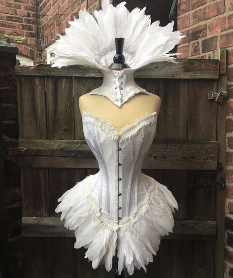 Jennifer on Instagram: “My fingers are shredded from the hand sewing, but the white feather collar finally has the matching corset! #white #WhiteSwan #feather…” Feather Corset, Angel Dresses, Feather Collar, Tulle Long Skirt, White Peacock, Witch Fashion, Angel Dress, White Corset, White Feather