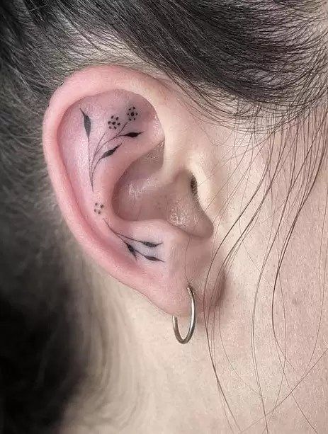 The Ultimate Guide To Flower Tattoos On Ear Tattoos For Women, Eat Tattoos Women, Ear Tattoos For Women Inner, Floral Ear Tattoo, Ear Tattoos Women, Cleavage Tattoos For Women, Tattoo Oreille, Ear Lobe Tattoo, Cleavage Tattoos