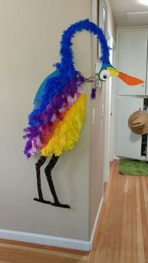 Kevin from Disney Pixar UP movie Made from cardboard, spray paint, feathers & a little imagination Up Themed Bedroom, Pixar Up Birthday Party, Disney Up Centerpieces, Pixar Centerpieces, Up Disney Party, Up Adventure Is Out There, Disney Up Decorations, Up Crafts Pixar, Up Movie Activities