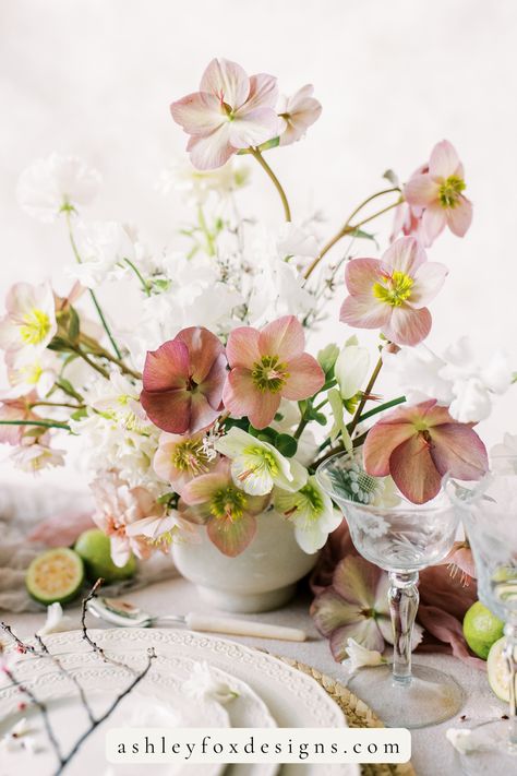 A floral centerpiece that is full of character and color, this arrangement features a color palette of soft pinks and reds, with pops of green and yellows. Floral Workshop, Wedding Flowers Tulips, Farm Images, Silk Bouquet, Wedding Reception Flowers, Wedding Tablescape, Ribbon Bouquet, Tablescape Inspiration, Spring Wedding Flowers