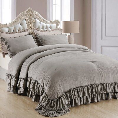 Brighten up your master suite and bring a touch of feminine style to your abode with this bedding set! it’s crafted from ultra-soft and cozy stone washes polyester and filled with a polyfill for warmth and comfort. Beautiful flowing ruffles, in a hue, add charming appeal to the shabby farmhouse comforter. It fits seamlessly into many decor themes, including farmhouse, coastal, shabby elegance, French country, minimalist, hygge and more. Color: Gray, Size: Queen Comforter + 2 Standard Shams | Ros Boho Chic Bedding, Taupe Bedding, Ruffle Comforter, French Country Bedding, Fluffy Comforter, King Size Comforter Sets, Grey Comforter, King Size Comforters, Bedding Comforter