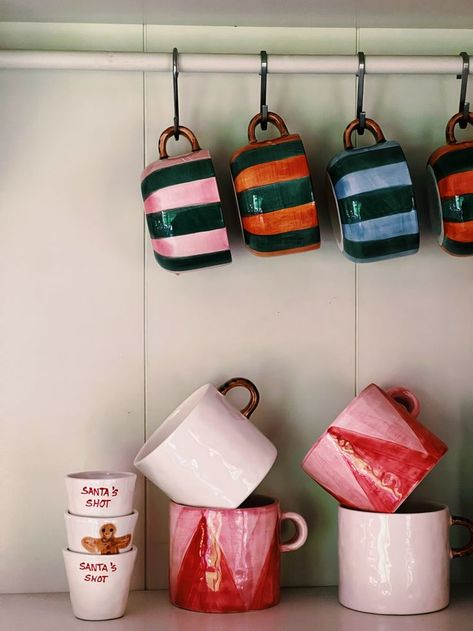 From bright stripes to groovy patterns, these hand-painted mugs from Anna + Nina makes mugs you'll want to put on display. They make great gifts too! Striped Bowl, Festive Table Setting, Anna Nina, Mug Display, Cappuccino Mugs, Hand Painted Mugs, Keramik Design, Christmas Interiors, Mug Collection