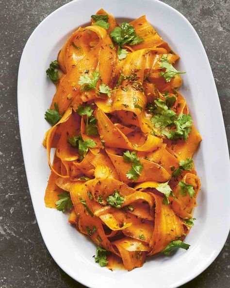 For this cumin-spiced carrot ribbon salad, ribbons of shaved carrot are tossed with toasted cumin, honey, oil, and cider vinegar dressing. It's a healthy side dish that's easy to toss together, making it perfect for picnics, potlucks, and weekend cookouts. #picnicfood #carrotsalad #healthysides @joe_woodhouse Carrot Ribbon Salad, Cider Vinegar Dressing, Ribbon Salad, Cilantro Salad, Steamed Asparagus, Healthy Side Dish, Healthy Recipes Clean, Vinegar Dressing, Honey Oil