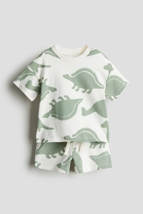 2-piece Top & Shorts Set - Regular waist - Round neck - Cream/Dinosaurs - Kids | H&M AU 1 Small Boy Clothes, Farm Logo Design, Toddler Essentials, Shirt And Shorts Set, Top Shorts Set, Top And Shorts Set, Shirt And Shorts, Dinosaur Kids, Accessories Jacket