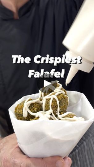 The Crispiest Falafel | Our editorial director J.M. Hirsch travelled to Jordan in search of the crispiest, lightest falafel—fried in immense pots by street vendors, served up in... | By Christopher Kimball’s Milk StreetFacebook Brown Paper Bags, Falafel Recipe, Milk Street, Street Vendors, Chick Pea, Jordan Travel, German Recipes, Street Vendor, Brown Paper Bag