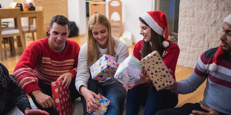 Learn How to Play Dirty Santa – The Best Christmas Game Ever | Southern Living Christmas Party Playlist, Ridiculous Gifts, Cookie Tips, Gift Exchange Party, Swap Gifts, Fun Christmas Games, Christmas Gift Exchange, Christmas Game, Santa Doll