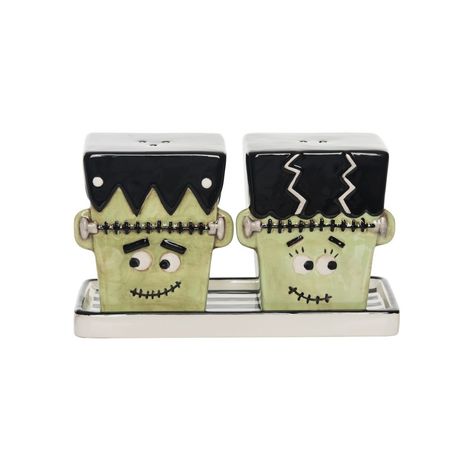 This beautiful set from Transpac's Trick or Treat collection is sure to bring some added flair to your Halloween season! Designed by Kim Sharp and made of Dolomite, this salt & pepper shaker is the perfect addition to your home assortment - or a gift for those who matter most! Frankenstein Bride, Halloween Frankenstein, Chip And Dip Sets, Witch Boots, Witch Legs, Frankenstein Halloween, Halloween Witch Hat, Halloween Party Supplies, Bride Of Frankenstein