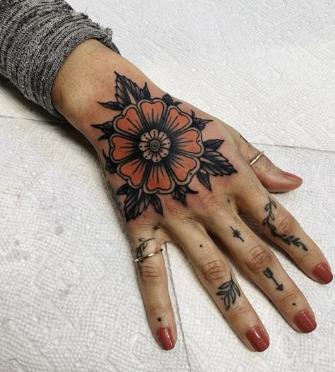 Traditional Top Of Hand Tattoo, Trad Tattoo Hand, Hand Tattoos For Women American Traditional, American Trad Hand Tattoo, Finger Tattoo Traditional, Traditional Tattoo On Hand, Hand Tattoo American Traditional, Elbow Tattoos For Women Traditional, Traditional Finger Tattoos Women