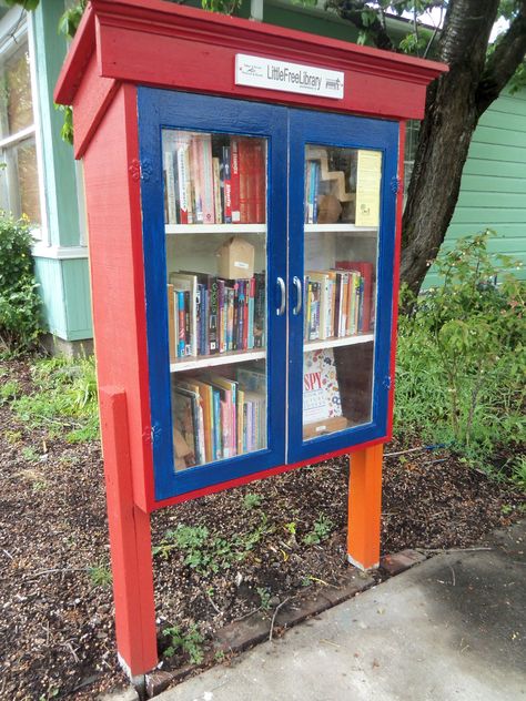 Sarah Chilcote. Salem, OR. Our Little Free Library is big, because we have so many neighbors and a very busy street. Our micro-hood of seven homes has pledged to support this library, and we have books for all ages and in both Spanish and English. Neighborhood Library, Mini Shed, Little Free Library Plans, Little Free Pantry, Tiny Library, Street Library, Library Plan, Library Inspiration, Lending Library