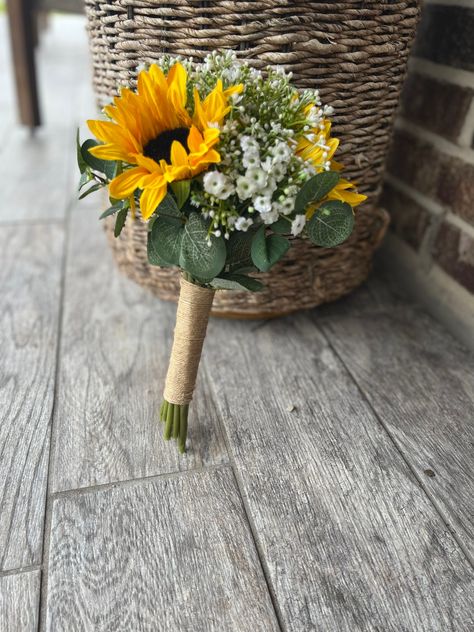 "Sunflowers and baby's breath bouquet with eucalyptus greenery perfect for a Fall, Summer, Farm or Sunflower theme wedding! 🌻 Available in 2 sizes (all sizes are approximate and are measured in diameter of the bouquet): -7\" Bridesmaid (3 sunflowers) -12\" Bride (12 sunflowers) **If you would like a different handle wrap for the bride bouquet than the bridesmaids, feel free to look around my shop for ideas and I would be happy to customize it for you at no charge. This bouquet goes perfect with Sunflower Wedding Fall, Sunflower Bridesmaid Bouquet, Autumn Bridal Bouquet, Country Wedding Bouquets, Fall Bridal Bouquet, Bouquet Sunflower, Sunflower Bridal Bouquet, Wedding Bridesmaid Bouquets, Prom Bouquet