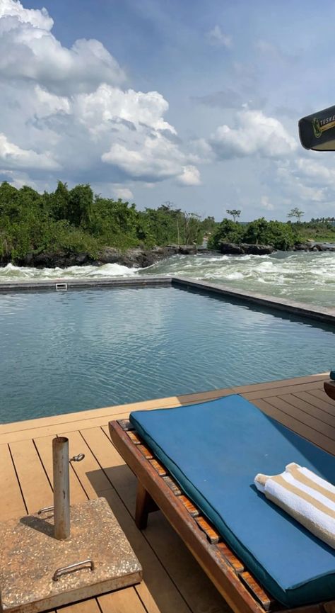 This image shows the pool side of Lemala wild waters lodge in Uganda. Ugandan Aesthetic, Jinja Uganda, Holiday Bed, Wild Waters, Visit Places, Birthday Inspo, Pool Side, Winter 2024, Travel Style