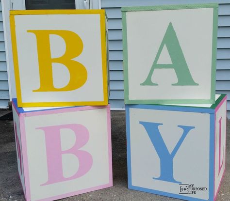 Baby Shower ABC Blocks - My cousin is going to be a grandmother!  So, that means it's time to have a baby shower. She had some scrap pieces of 3/4" plywood, so Shower Foods, Onesie Decorating, Baby Blocks Baby Shower, Baby Freebies, Mother Daughter Projects, Abc Blocks, Favorite Childhood Books, Diy Blocks