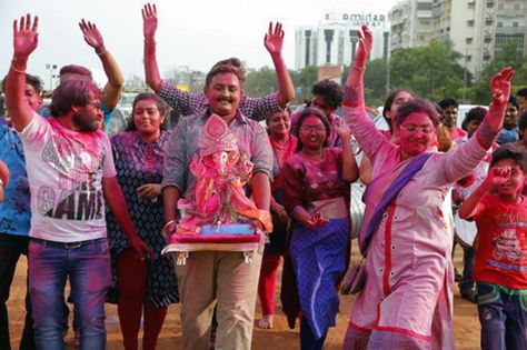 Devotees dance as they carry an idol of Ganesha to immerse in an artificial pond near river Sabarmati during Ganesh Chaturthi in Ahmadabad, on August 26. (Source: AP) Ganesh Chaturthi Memory Drawing, Artificial Pond, Ganesh Visarjan, Drawing Composition, Memory Drawing, Ganpati Festival, Dj Dance, Decoration For Ganpati, Dance Images