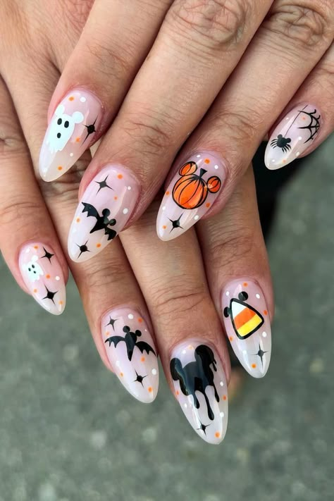 Experience the magic of Disney Halloween with these adorable candy corn nail art designs by Valerie Fritz (@nails.by.valerie) featuring Mickey’s iconic ears. It’s a delightful fusion of beloved Disney charm and the festive spirit of Halloween. These nails are a must-see for anyone who wants to add a touch of enchantment to their seasonal style. Disney Halloween Nails, Disneyland Nails, Candy Corn Nails, Disney Nail Designs, Disney Acrylic Nails, Minnie Mouse Nails, Mickey Nails, Holloween Nails, Halloween Acrylic Nails