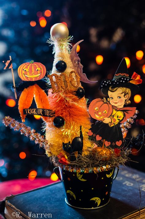 This is a one of a kind, vintage, Halloween assemblage. Made in a vintage Halloween tin stuffed full of fun fall goodies... Vintage Halloween cupcake pics, hand dyed bottle brush tree, repro vintage graphics, and tinsel. Stands approx. 9x7 inches tall. Original and Unique. Halloween Assemblage, Cupcake Pics, Retro Halloween Decorations, Witch And Cat, Fall Goodies, Happy Halloweenie, Cupcake Pictures, Halloween Iii, Halloween Cupcake