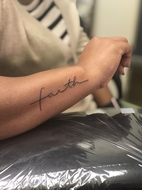 Faith Forearm Tattoo Women, Faith Tatoos, Faith Tattoo Ideas For Women, Faith Tattoos, Faith Foot Tattoos, Cross Tattoo On Hand, Wrist Tattoos Words, Fear Tattoo, Faith Tattoo On Wrist