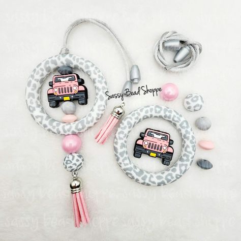 DIY CAR CHARM KIT INCLUDES: Kit will make 1 DIY CAR CHARM KIT CONTENTS: Supplies to make 1 Car Charm, including ~ ~ 1 - Gray and White Leopard Jumbo Silicone Ring (Complete car charm in the photo are for reference only. They are NOT included in the kit) ~ 1 - Pink Car Silicone Bead ~ 5 - Silicone Color Coordinating Bea Silicone Bead Car Hangers, Keychain Crafts Diy, Beaded Car Charms Rear View Mirror, Beadable Products Diy, Focal Bead Ideas, Diy Silicone Bead Keychain, Diy Car Charms, Car Charms Diy, Silicone Bead Ideas