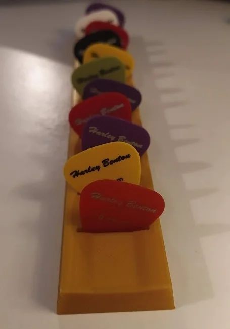 Guitar pick holder by yompyamper - Thingiverse Guitar Pick Organization, Crochet Guitar Pick Holder, Guitar Pick Display, Guitar Pick Holder Diy, Clay Guitar Pick Holder, Pick Holder Diy Guitar, Guitar Pick Art, Guitar Pick Storage, Guitar Pick Holder