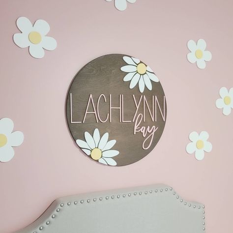 Custom personalized daisy retro nursery wood name sign white flower 90's boho circle round pink daisies wall decal stickers plaque bundle by thelittletableau on Etsy Flower Name Sign Nursery, Pink Daisy Nursery Theme, Daisy Name Sign, Baby Girl Nursery Daisy Theme, Daisy Nursery Decor, Daisy Themed Nursery, Daisy Nursery Theme, Baby Girl Name Signs, Pink And Yellow Nursery