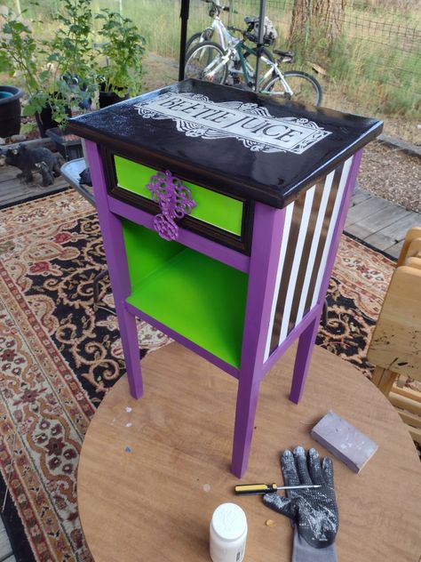 A fun side table that I found at a thrift store. I repurposed it into beetle juice theme! Halloween Furniture Diy, Beetlejuice Furniture Diy, Beetlejuice Furniture, Beetlejuice Bedroom, Beetlejuice Crafts, Beetlejuice Bathroom, Beetlejuice Painting, Goth Decor Diy, Beetlejuice Room