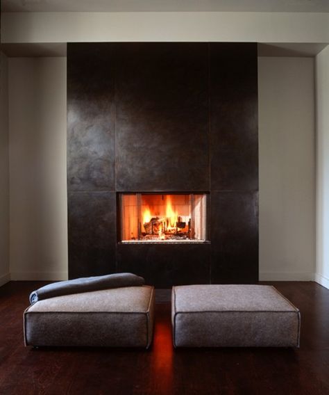 Fabulous finish on this fireplace. Large steel sheets but I don't know how they made the final finish.  Would have to ask a custom steel fabricator. Contemporary Fireplace Designs, Minimalist Fireplace, Metal Fireplace, Contemporary Fireplace, Home Fireplace, Modern Fireplace, Minimalist Interior Design, Fireplace Inserts, Brick Fireplace