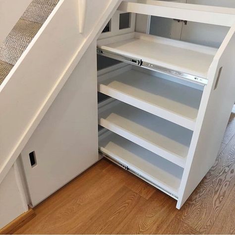 This minimalist under stair storage by SBT Designs uses Accuride drawer slides to create a pullout shoe storage rack, coat closet, and adjustable shelves. Visit our website for more under stair storage ideas! Keywords: Accuride, drawer slides, carpentry, diy, entryway, hallway, home decor, home interior, interior architecture, interior design, organization, smart storage, stairs storage, storage ideas, storage solutions, under stair storage, woodworking, woodworking plans, woodworking projects Shoe Racks Under Stairs, Pullout Shoe Rack, Shoe Cabinet Under Stairs, Shoes Storage Under Stairs, Shoe Rack Under The Stairs, Under Staircase Drawers, Shoe Rack Under Staircase, Shoe Rack Under Stairs, Under Stairs Shoe Storage