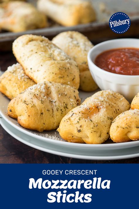 Ooey gooey cheese in a parmesan crusted flaky crescent roll... How delicious does that sound? These Crescent Mozzarella Sticks are perfect as an after school snack, game day, or just when you're in the mood for cheese! 🧀 #Pillsbury #PillsburyCrescents #MozzaSticks #Appetizer Cheese Sticks With Crescent Rolls, Crescent Roll Mozzarella Sticks, Crescent Roll Recipes Mozzarella, Mozzarella Sticks Crescent Rolls, Recipes With Mozzarella Sticks, Crescent Roll Pizza Bites, String Cheese Crescent Rolls, Crescent Roll Cheese Sticks, Mozzarella Crescent Rolls