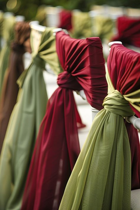 Dreaming of a Tuscan-themed wedding? 🍇🌿 Transform your venue with these stunning chair covers in olive green and wine red. Channel the romance of Italy's vineyards for a day to remember! #WeddingInspiration #TuscanWedding #ChairCovers #WeddingDecor #EventDesign #RusticCharm #ItalyWedding #VineyardVibes Wine Red And Sage Green Wedding, Maroon And Olive Green Wedding, Green And Wine Wedding, Green And Red Wedding Theme, Olive Green Weddings, Chair Covers Wedding, Tuscan Wedding, Wine Wedding, A Day To Remember