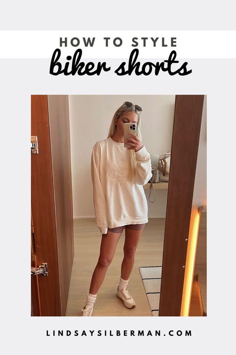 One closet staple that I love to wear on repeat? Biker shorts. Here are a handful of ways to wear biker shorts, regardless of the occasion. Get lots of biker shorts outfit ideas for women in this guide to wearing biker shorts this season. | biker shorts outfit fall | biker shorts outfit summer casual | biker shorts outfit aesthetic | biker shorts outfit fashion | biker shorts outfit women aesthetic | how to wear biker shorts casual | how to style biker shorts casual Biker Shorts Outfit Fashion, Fall Biker Shorts Outfit, Biker Shorts Outfit Fall, Biker Shorts Outfit Aesthetic, Casual Biker Shorts Outfit, Biker Shorts Outfit Summer Casual, Lindsay Silberman, Short Outfit Ideas, Athleisure Outfits For Work