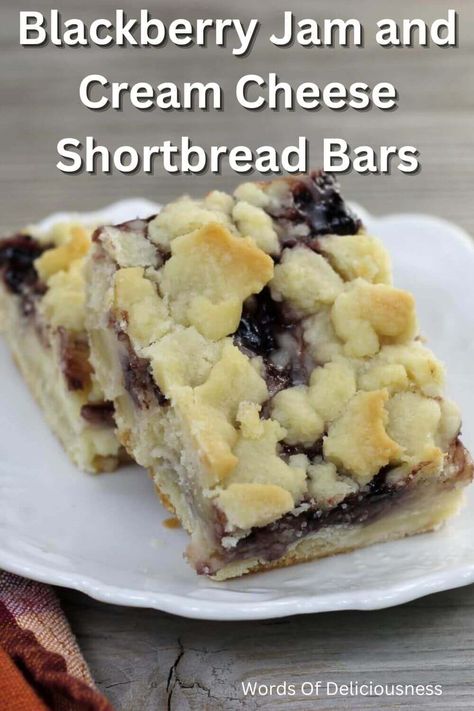 Blackberry Jam and Cream Cheese Shortbread Bars have a buttery top and bottom layer with a creamy filling made with cream cheese and jam. #blackberryjamandcreamcheesebars #wordsofdeliciousness Blackberry Chocolate Dessert, Recipes Using Blackberry Jam, Blackberry Shortbread Bars, Recipes With Blackberry Jam, Cream Cheese Shortbread, Jam Desserts, Recipe Using Jam, Cream Cheese And Jam, Cheese Shortbread