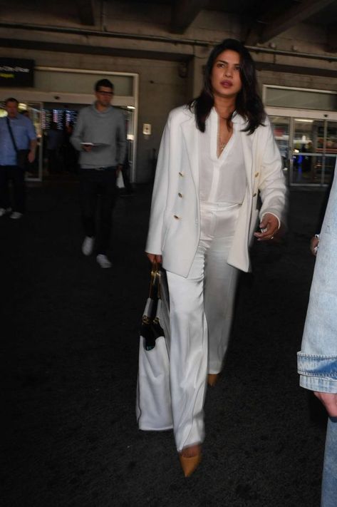 Photos : Priyanka Chopra – Arrives at Nice Airport in France - Celebrity.tn - N°1 Official Stars & People Magazine, Wiki, Biography & News Airport Look, Best Flights, Celebrity List, People Magazine, Priyanka Chopra, Rare Photos, Female Art, Duster Coat, Black Women