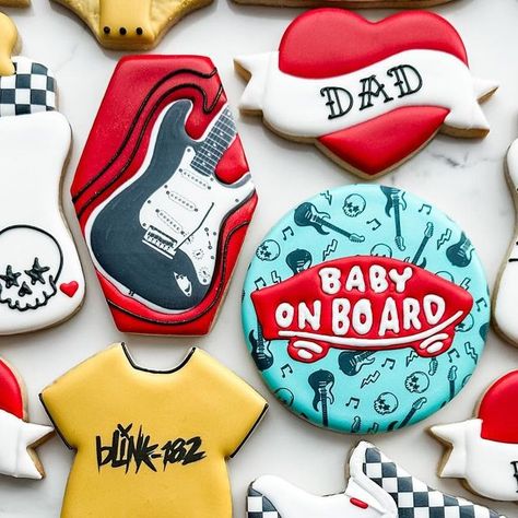 Mandy Edmunds on Instagram: "Have you ever seen baby shower cookies that rocked so hard? 👶🏻🤘🏻 These new parents requested a “Vans Warped Tour” theme, complete with band t-shirt onesies, classic checkered Vans, and electric guitars. So fun!  #sugaredupcookies  #customcookies #babyshowercookies #punkrockcookies #punkrock #rocknrollbaby #babyonboard #vanswarpedtour #warpedtour #warpedtourcookies #vanscookies #thevandals #blink182 #rancid #nofx #guitarcookies #vansshoes #hearttattoo #tattoocookies" Edgy Baby Shower Theme, Rockstar Baby Shower Ideas, Warped Tour Baby Shower Theme, Born To Rock Baby Shower Ideas, Rock N Roll Baby Shower Ideas, Vans Warped Tour Birthday Party, Vans Baby Shower Theme, Emo Baby Shower Ideas, Punk Rock Baby Shower